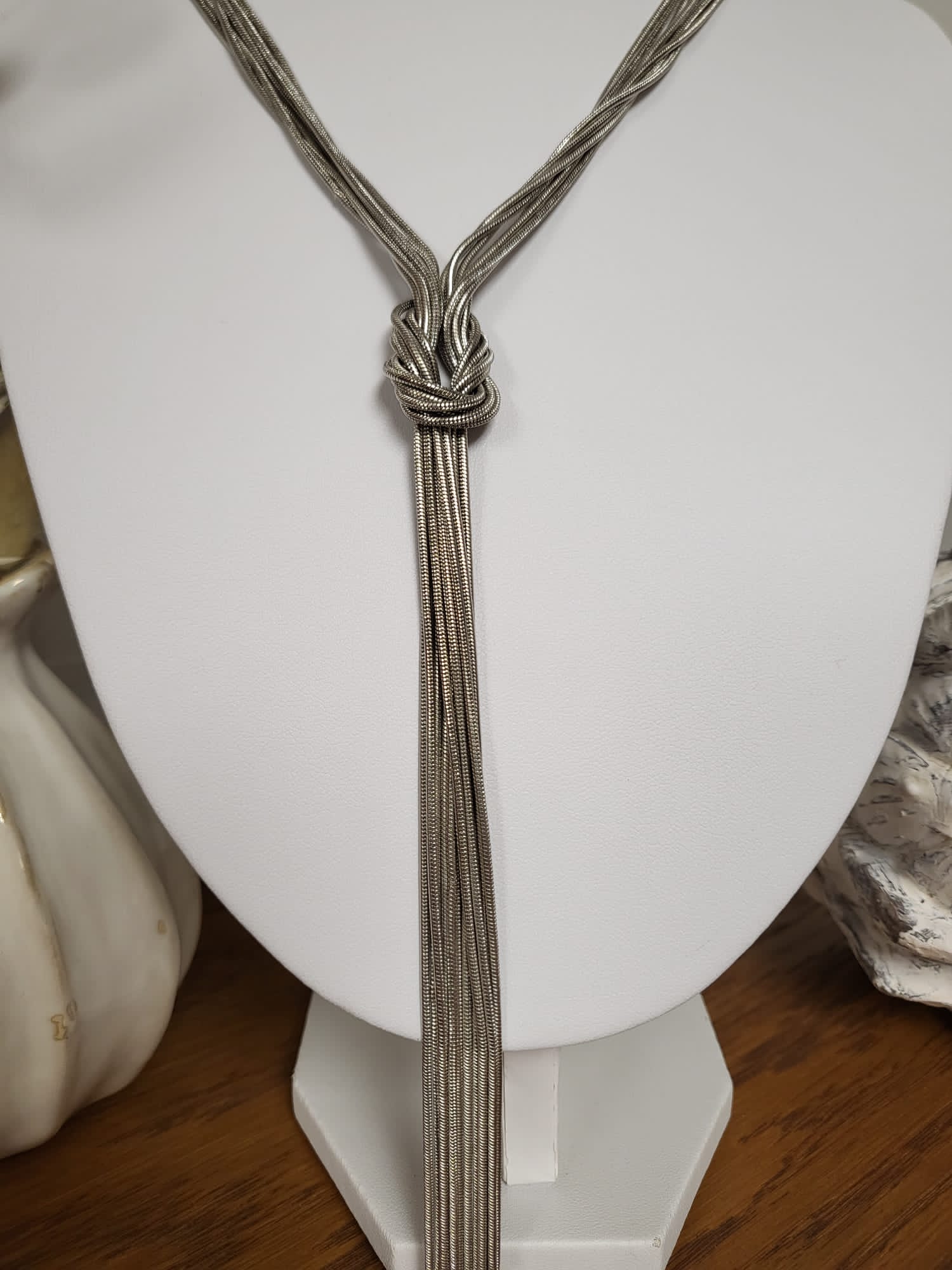 Long plain chain silver necklace with knot
